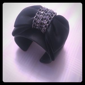 Black leather cuff with bow & rhinestone detailing